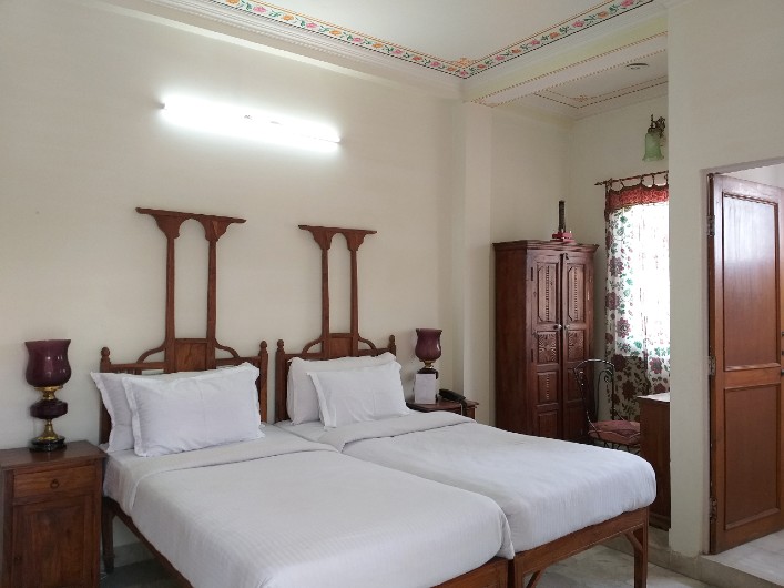 Comfortable air-conditioned triple room at Sneh Deep Guest House Jaipur